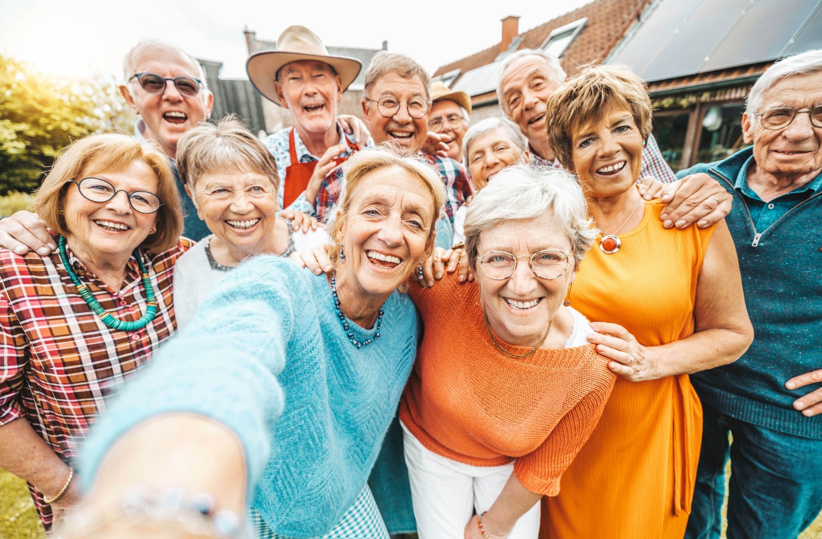 A group of senior friends take a selfie

